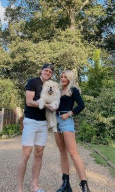 Conor Gallagher with his girlfriend Aine May and their dog Freddy.